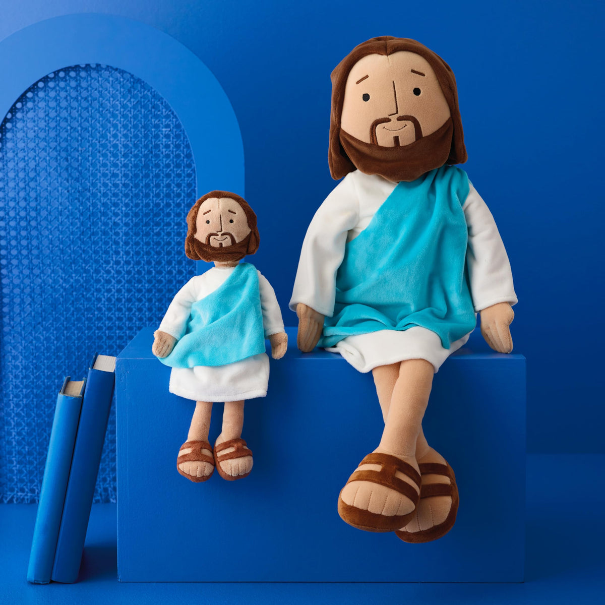 Hallmark Big My Friend Jesus plush weighted body for stable sitting.