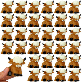 Halloscume Highland Cow party favors in brown, ideal for playful table decor and party favors.