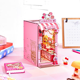 Hands Craft Hello Kitty Sweet Shop Book Nook Kit touch-led module adds warm glow.