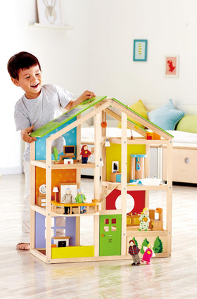 Hape All Seasons dollhouse interior bedroom setup supports rich storytelling and role play
