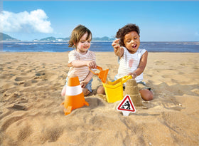 Hape construction sand toy set promotes outdoor social play.