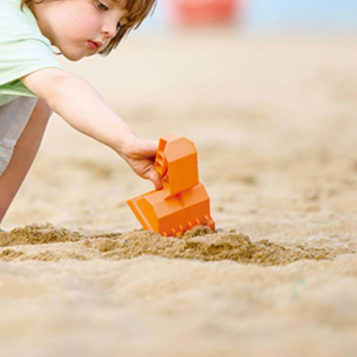 Hape construction sand toy set stackable bucket for tidy storage after play.
