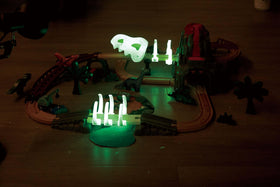 Hape dinosaur figurines and gemstone blocks boost imaginative play