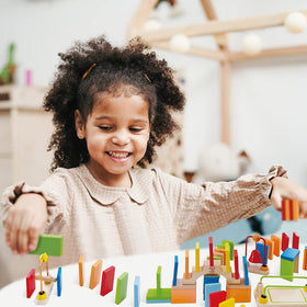 Hape Dynamo wooden dominoes sourced from sustainable forests.