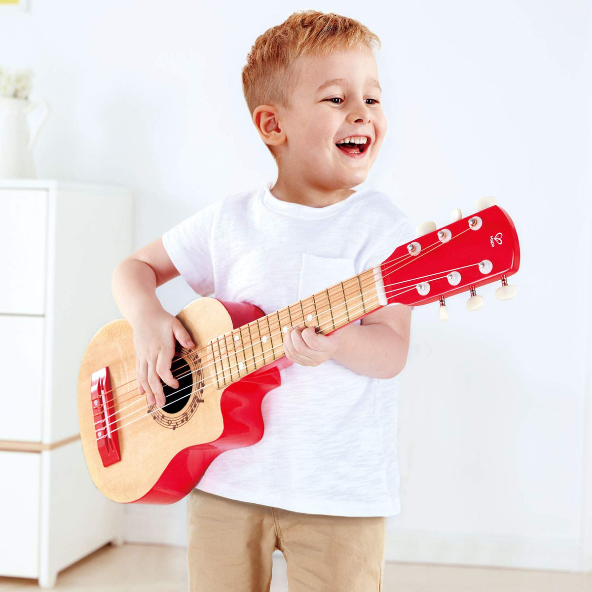 Hape Flame First Guitar nylon strings close-up for smooth play