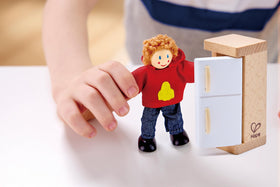 Hape wooden dolls with non-toxic finishes ensure safe, durable play sessions.