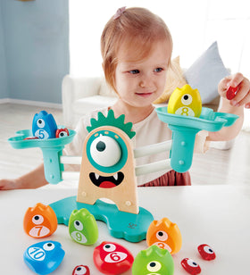 Hape Math Monster Scale child playing enhances concentration and math curiosity