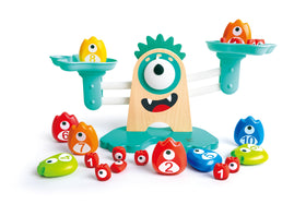 Hape Math Monster Scale showing large weights balanced for arithmetic play