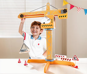 Hape Playscapes Crane Lift Playset assembly area inviting quick setup for playtime