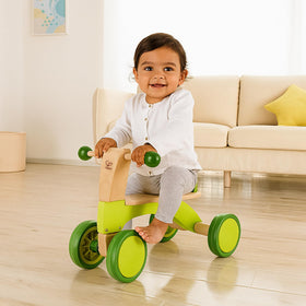 Hape Scoot Around side view shows sturdy wooden frame supporting mobility
