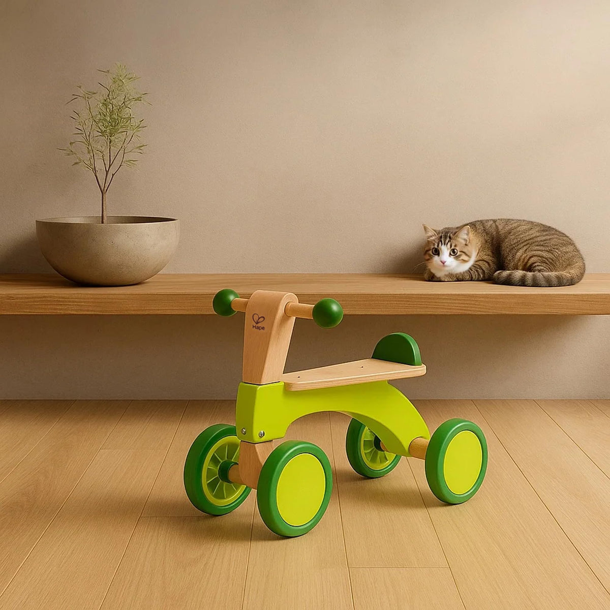 Hape Scoot Around close-up of rubberized wheels for durable, floor-friendly use