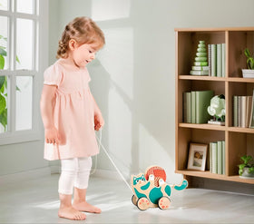 Hape wooden pull-along with rubber wheels for smooth floor protection during use.