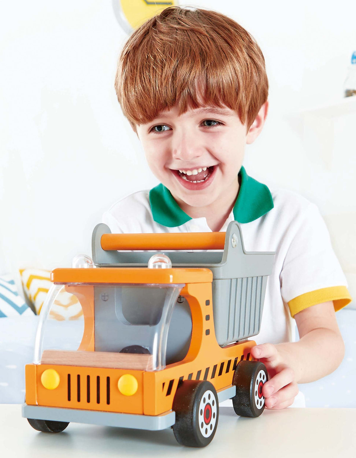 Hape wooden dump truck wheels emphasize sturdy support on any floor surface.
