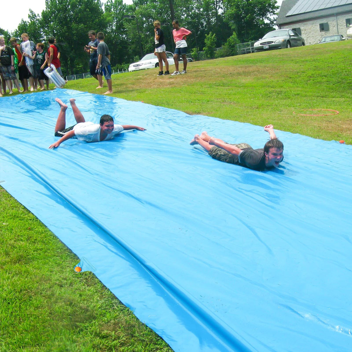 Happy Aplenty anchor points secure the slide during play.
