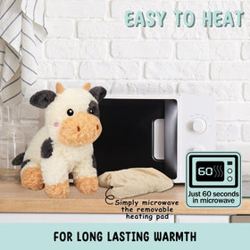 Happy Fuel soft black and white cow plush for gentle comfort and companionship.