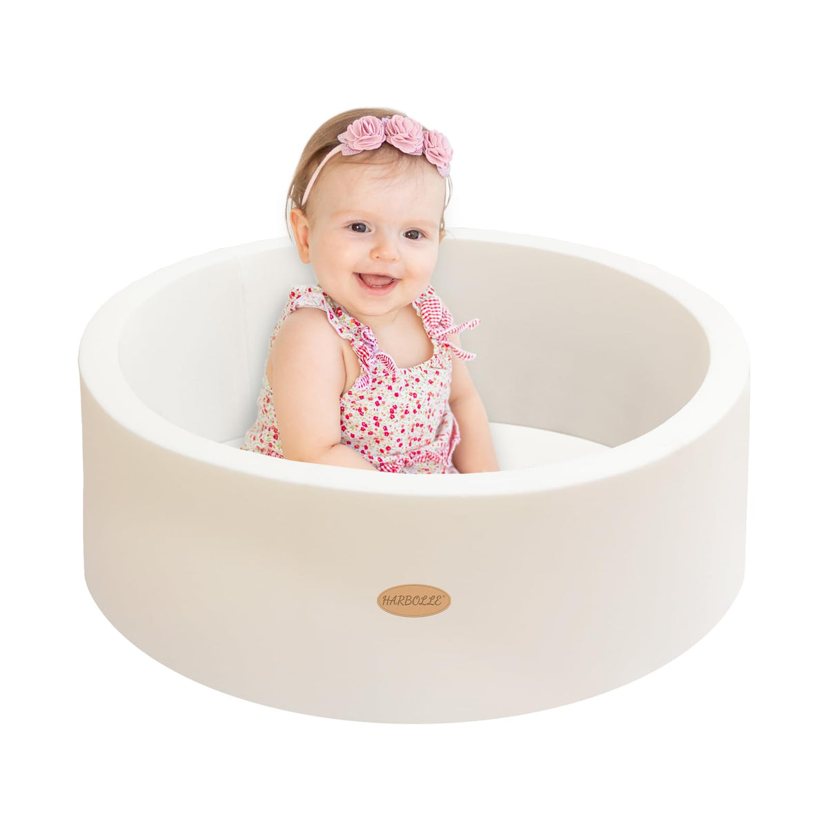 HARBOLLE baby ball pit with memory foam interior for cushioned play.