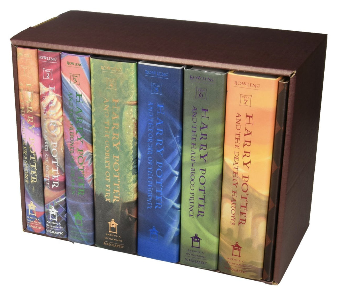 Spine-display view of the seven-book set inside the trunk chest