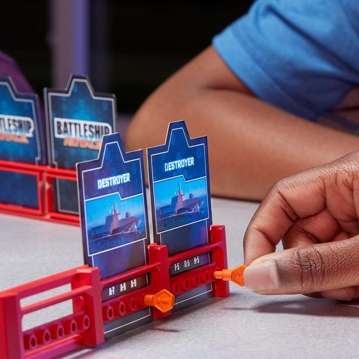 Hasbro Battleship Royale peg trays keep components organized