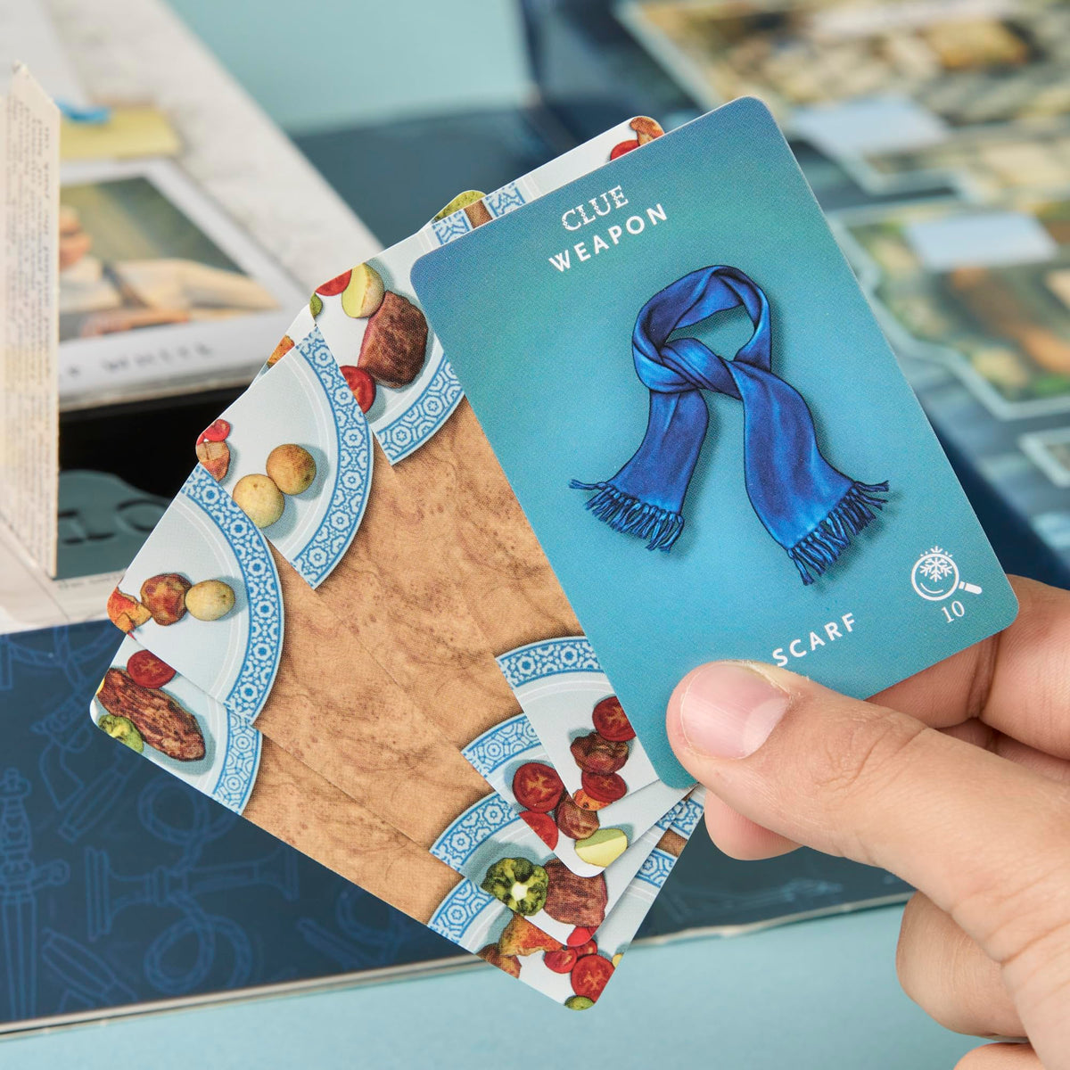 Hasbro Clue Secrets Under Snowfall cipher puzzles enhance cooperative play.