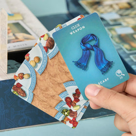 Hasbro Clue Secrets Under Snowfall cipher puzzles enhance cooperative play.