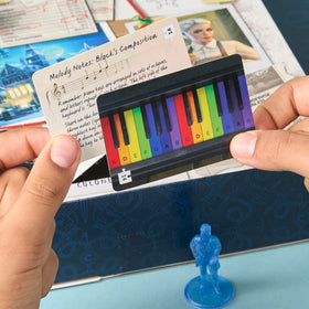 Hasbro Clue Secrets Under Snowfall door puzzles reveal next clue.