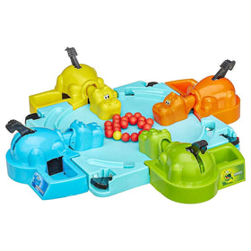 Hasbro Hungry Hungry Hippos shows four hippos ready to chomp in a fast-paced duel.