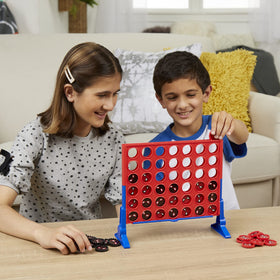 Hasbro Gaming Connect 4 Marvel Spider-Man night-ready game for kids 6+.