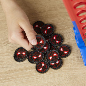 Hasbro Gaming Connect 4 Marvel Spider-Man Miles Morales disc for strategic moves.