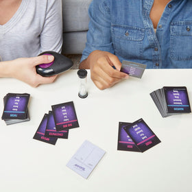 Hasbro Gaming Midnight Taboo timer adds fast-paced, competitive rounds.