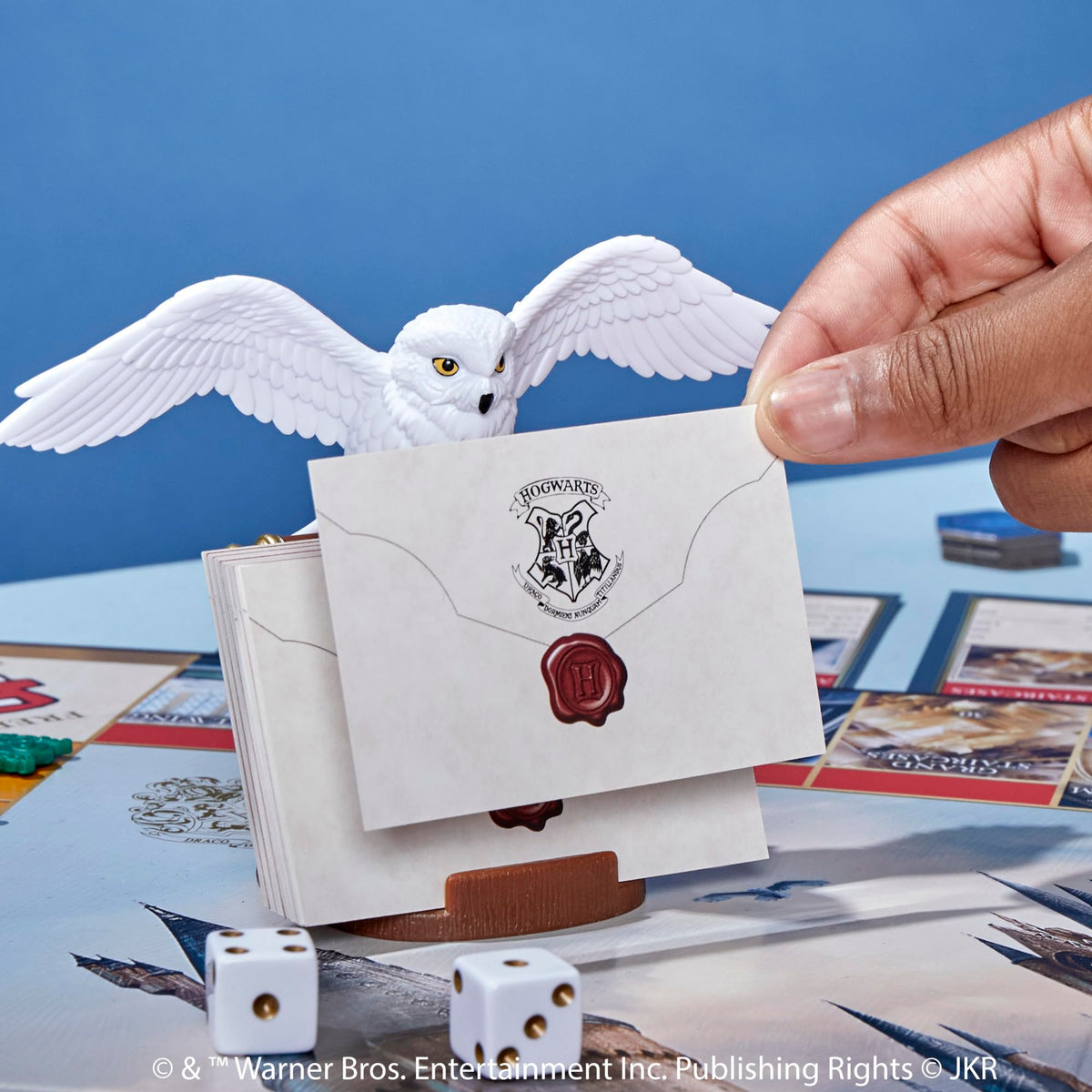Hogwarts-themed board sections highlight classrooms and common rooms for immersion.