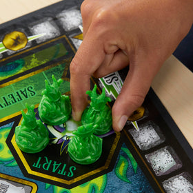Spell cards from Disney Villains Edition add twists to turns.