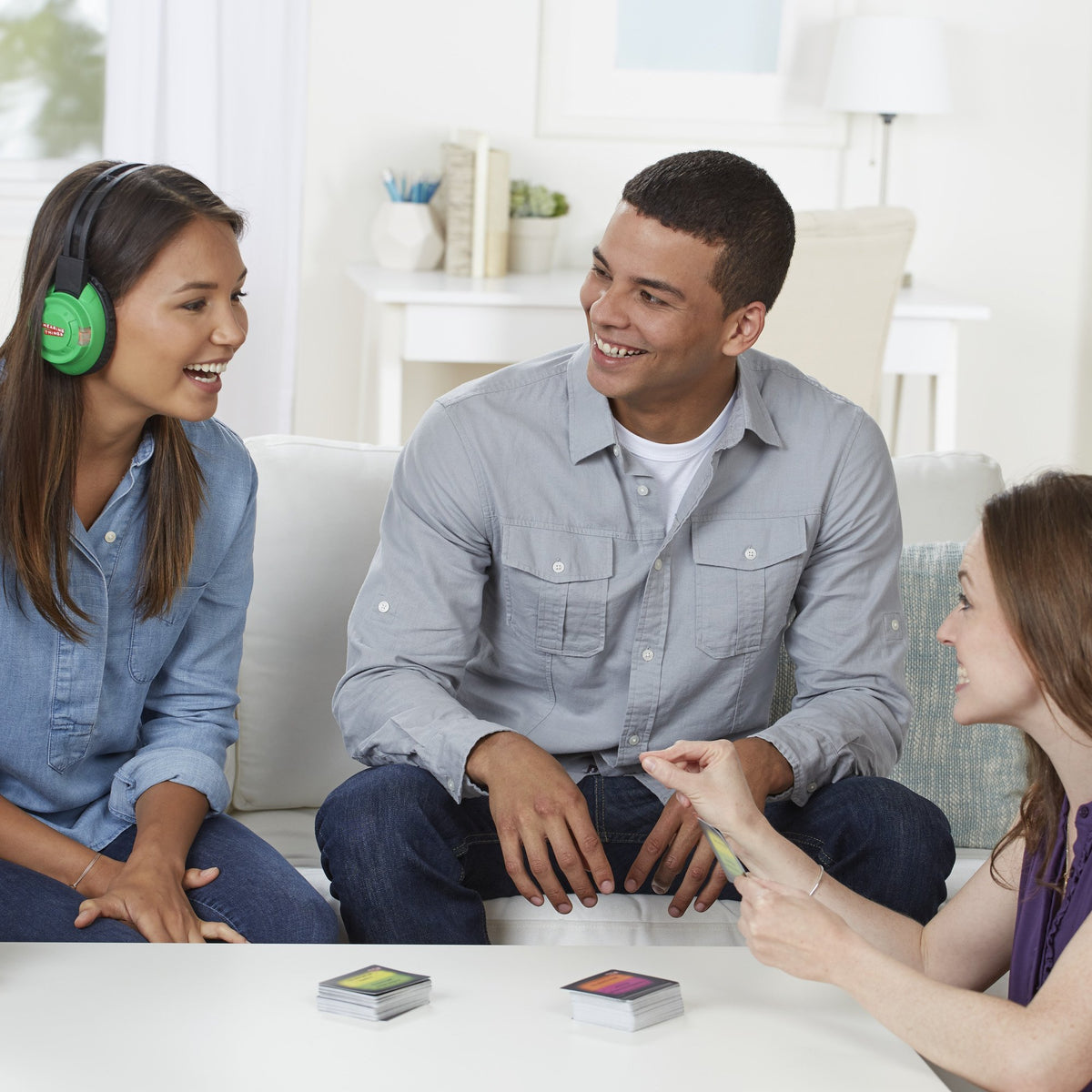 Hasbro Hearing Things game cards featuring 600 phrases for quick guessing