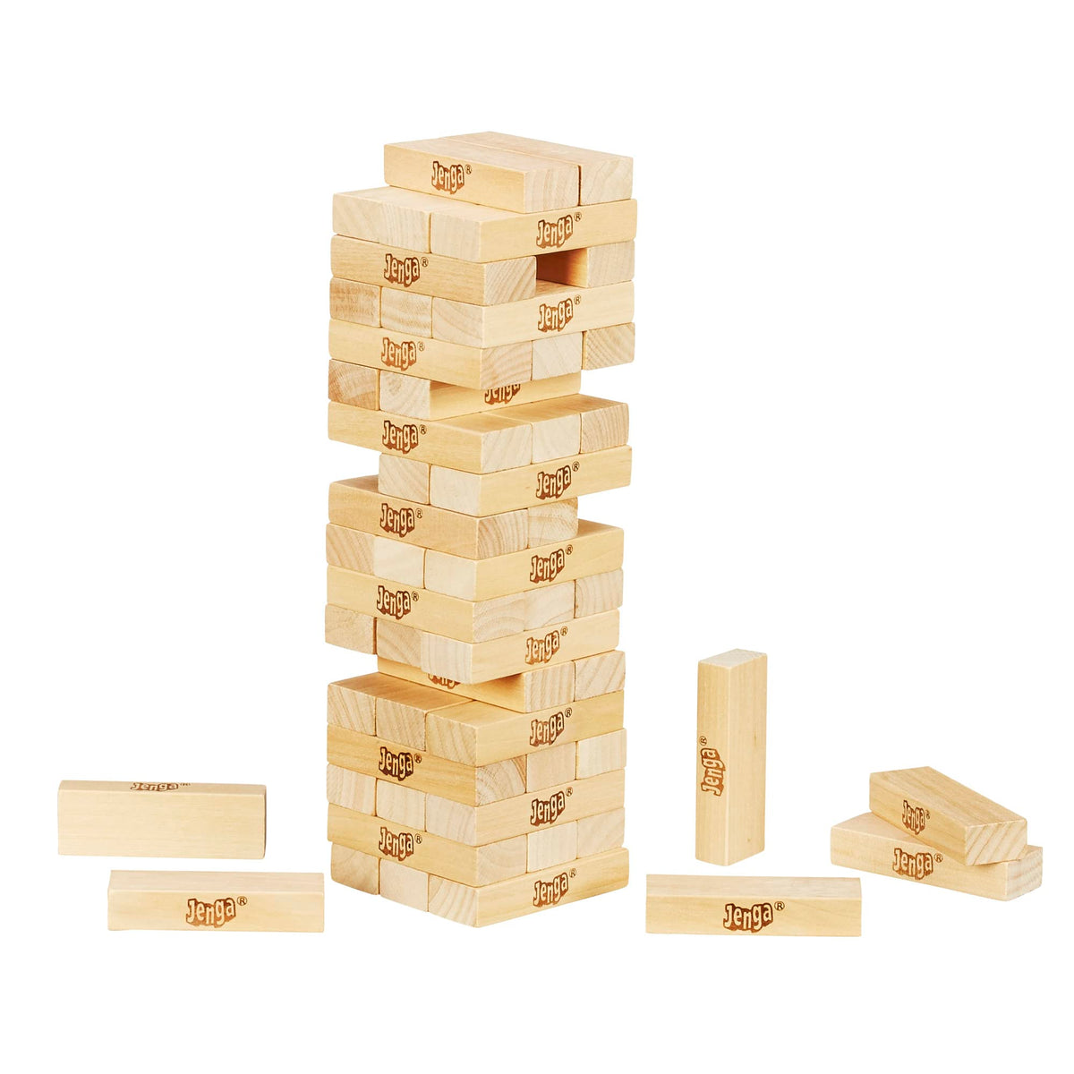 Hasbro Jenga block being pulled on the tower amid balanced gameplay