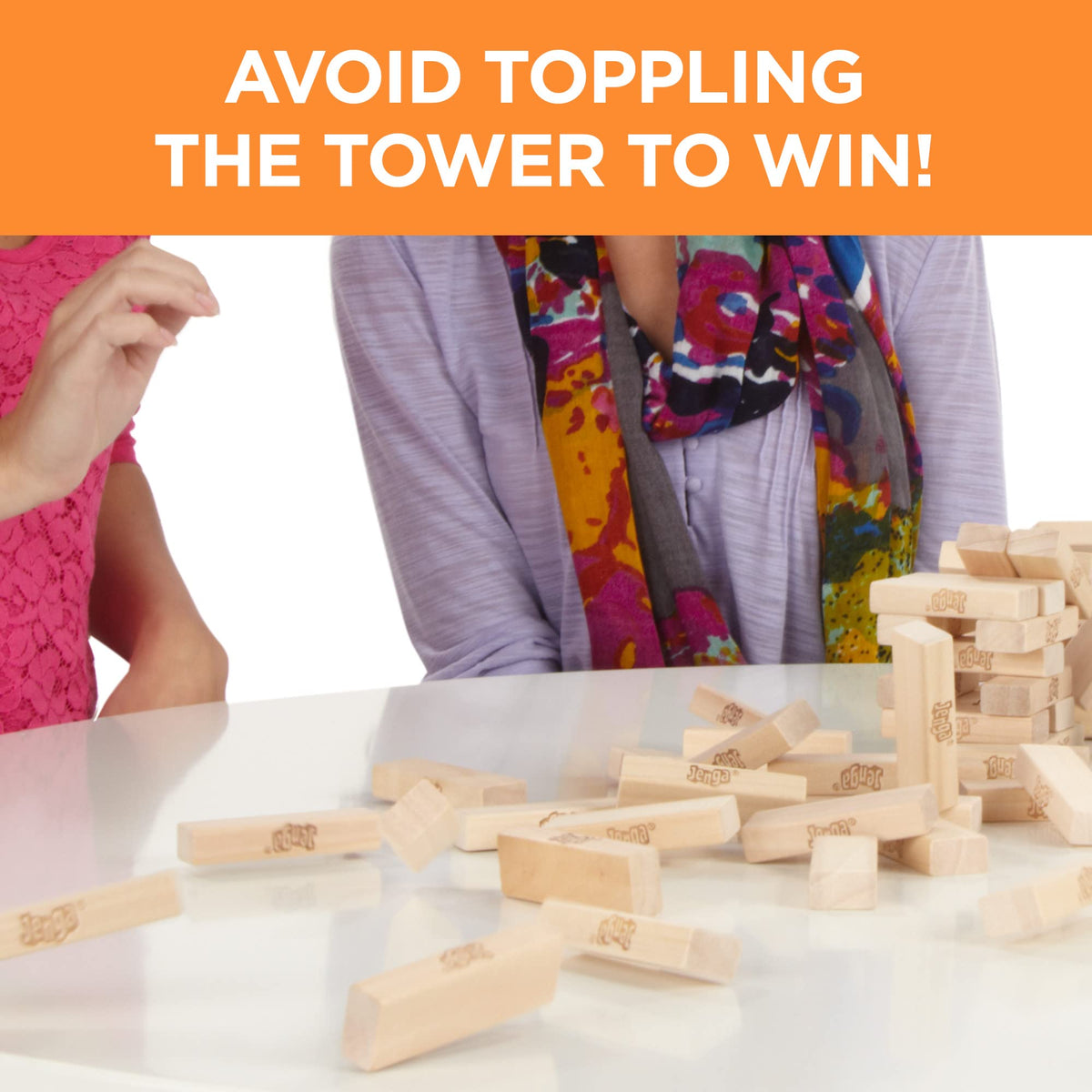 Hasbro Jenga family playing together during game night