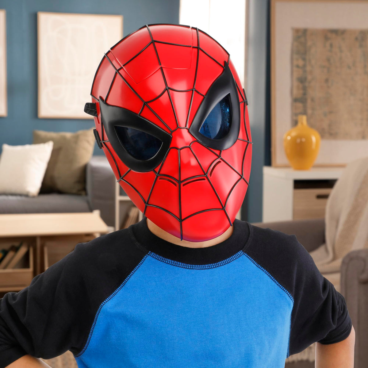 Hasbro Marvel Spider-Man Glow FX Mask worn by kids supports imaginative role play.