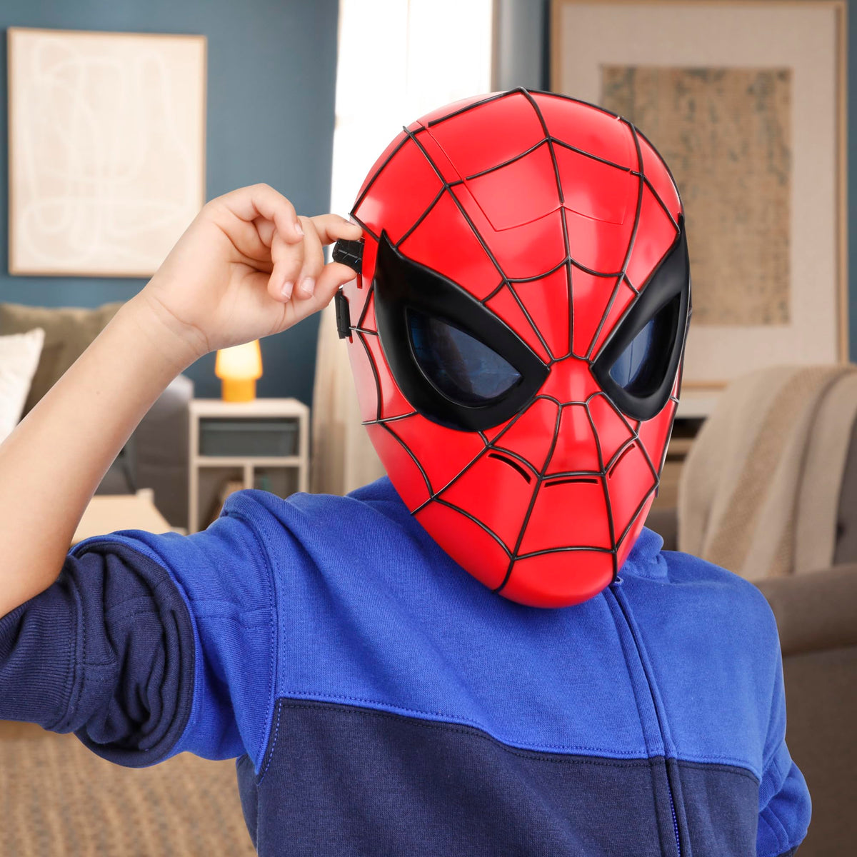 Hasbro Marvel Spider-Man Glow FX Mask light-up-lenses demonstrate dramatic effect in play.