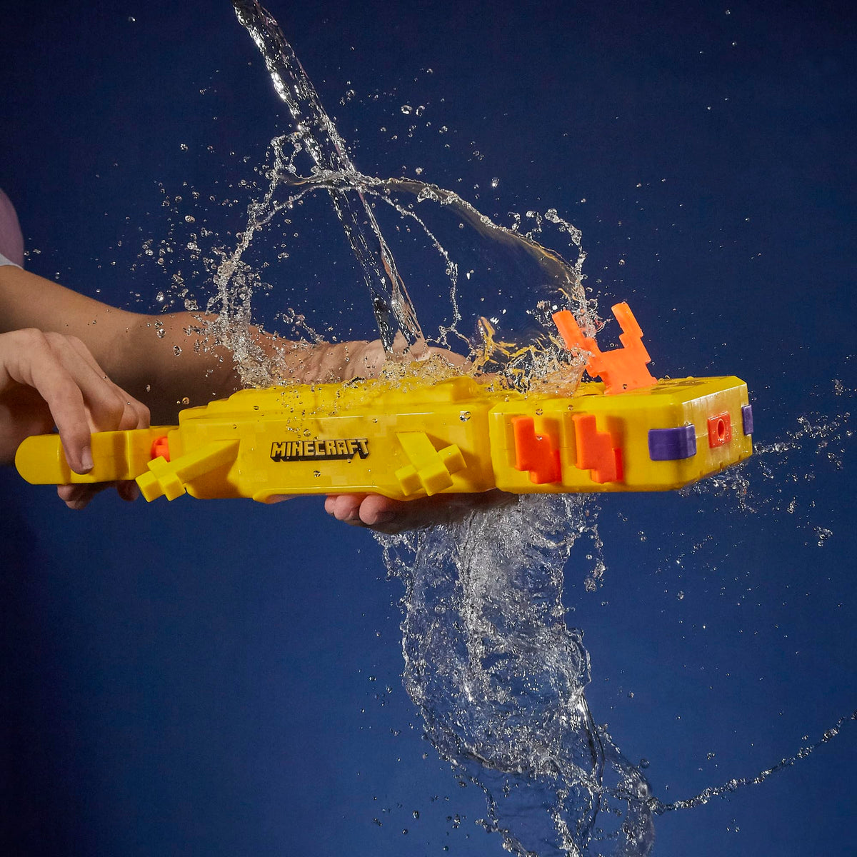 Hasbro Nerf Super Soaker Minecraft Axolotl Water Blaster in action for fast backyard battles