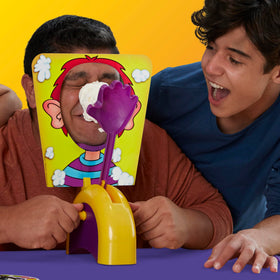 Hasbro Pie Face Game players turning handles, chasing 25-point win