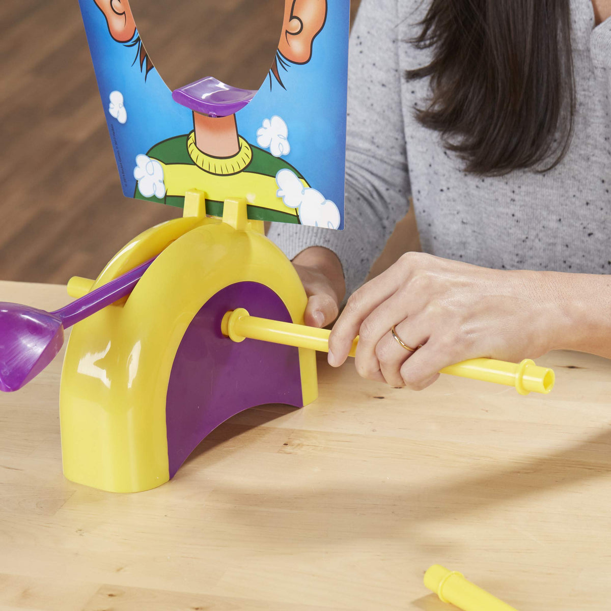 Hasbro Pie Face Spinner displayed to control timing and scoring.