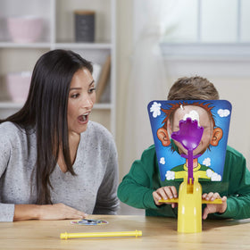 Hasbro Pie Face Splash Card shown beside the mask for splash control during play.