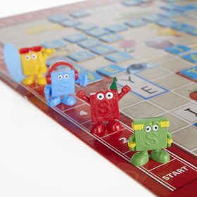 Hasbro Scrabble Junior score track helps kids track points during play.
