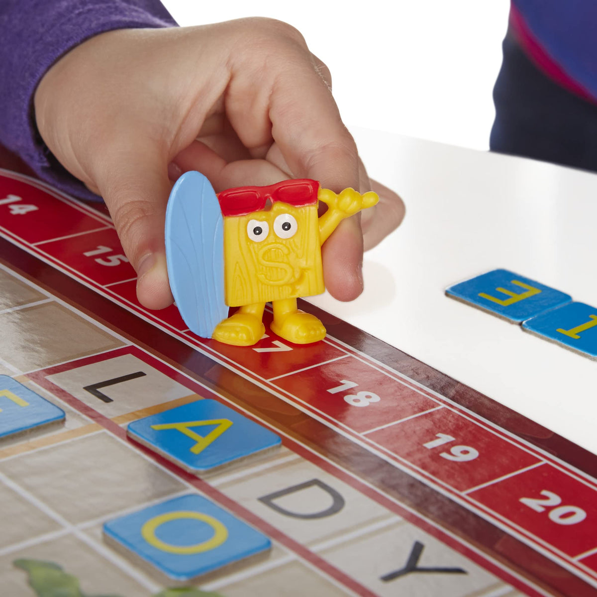 Hasbro Scrabble Junior tiles placement supports early word matching.