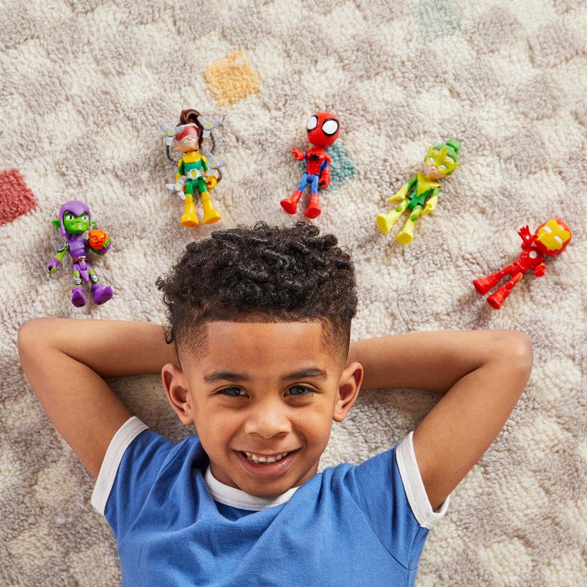 Child playing with Spidey figures encourages creative storytelling and collaboration