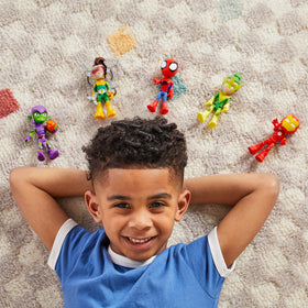 Child playing with Spidey figures encourages creative storytelling and collaboration