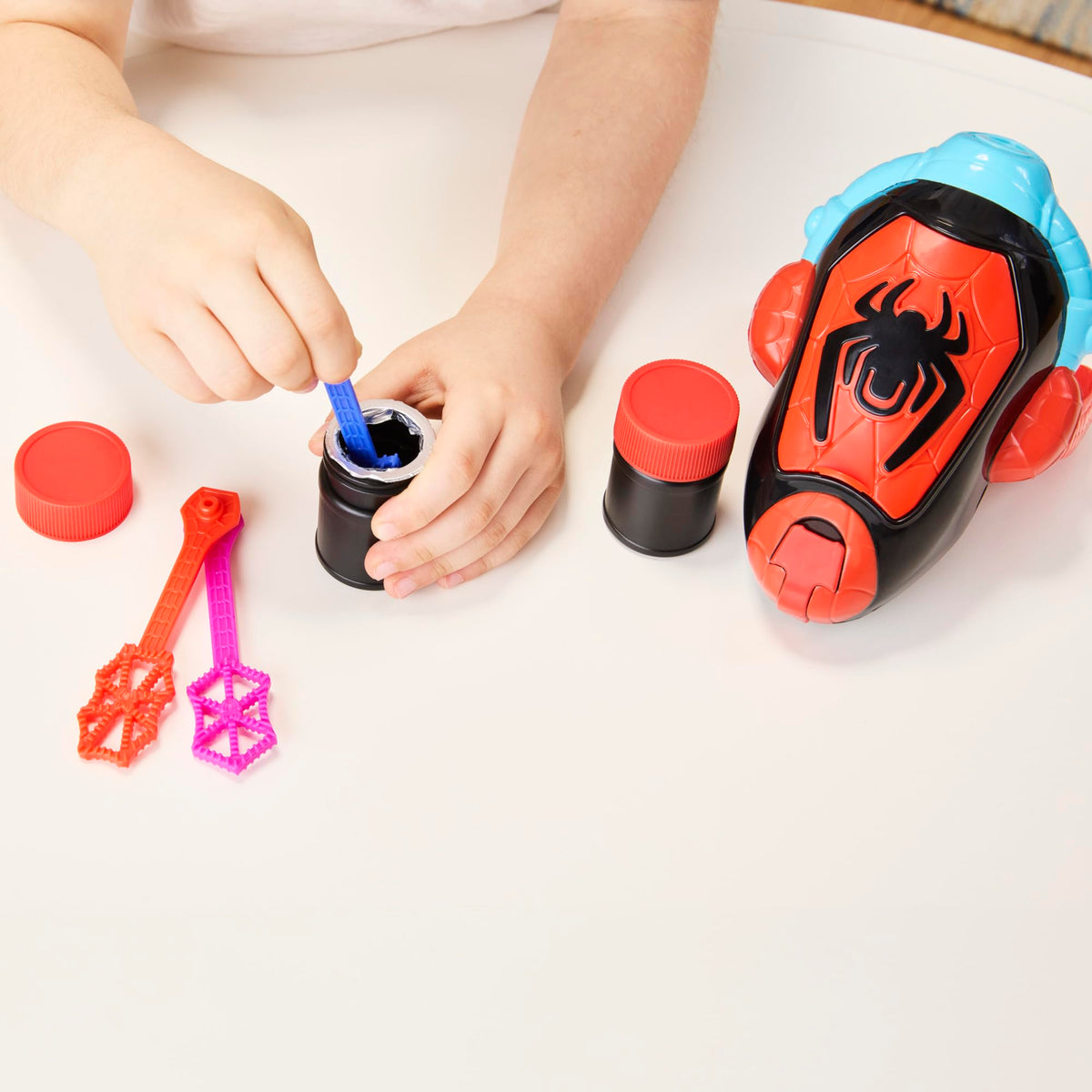 Electronic bubble blower delivers continuous bubbly action for pretend missions.