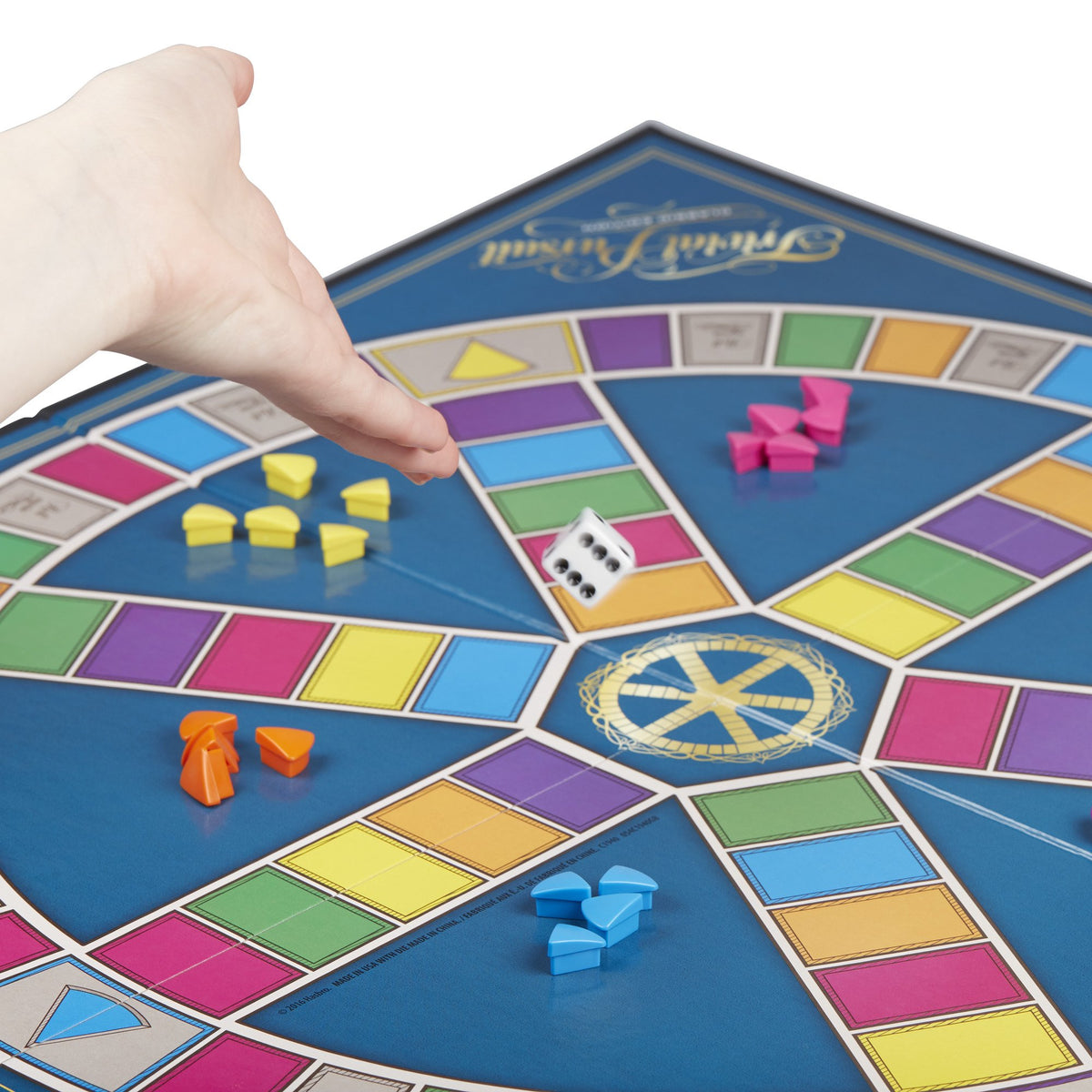 Hasbro Trivial Pursuit wedges in bright colors for category tracking and collecting.