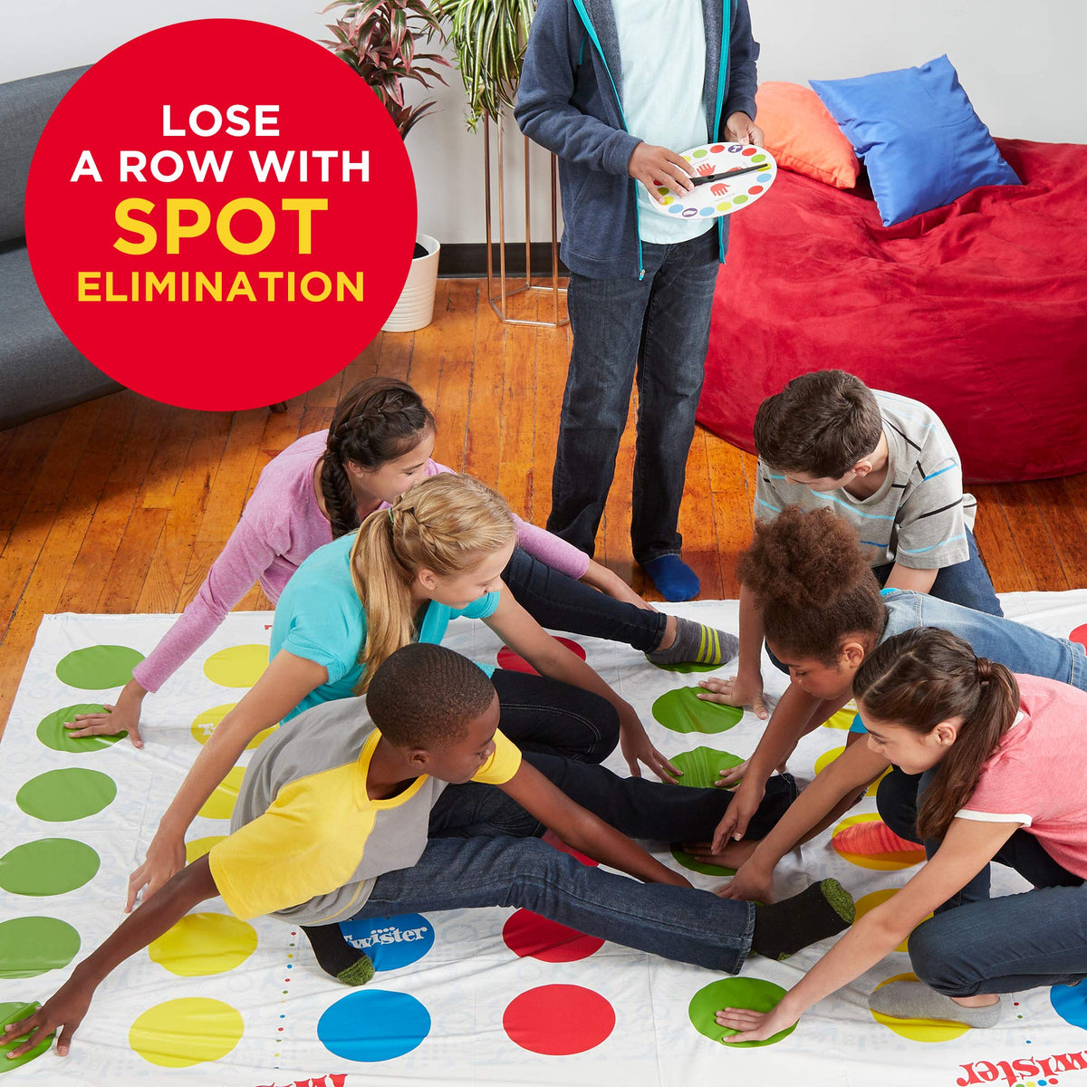 Hasbro Twister Ultimate spinner included for smooth turns.