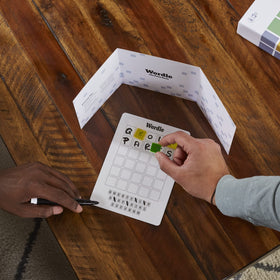 Hasbro Wordle Party Game players guess to win points.