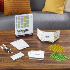 Hasbro Wordle Party Game markers accompany repeatable play sessions.