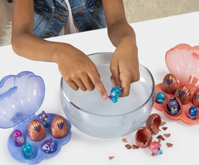 Six eggs inside Sapphire Springs packaging awaiting color-changing gems
